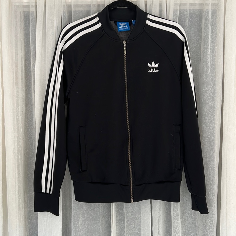 Medium black Adidas full-zip jacket.